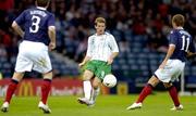 20 August 2008; Northern Ireland's Steven Davis threads a pass between Scotland's Gary Naysmith, right, and James Morrisson. International Friendly, Scotland v Northern Ireland, Hamden Park, Glasgow, Scotland. Picture credit: Dave Gibson / SPORTSFILE