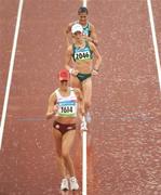 21 August 2008; Olive Loughnane, 2046, Ireland, comes down the finishing straight during the Women's 20km Walk Final, where she finished 7th with a personal best time of 1:27.45. Beijing 2008 - Games of the XXIX Olympiad, National Stadium, Olympic Green, Beijing, China. Picture credit: Brendan Moran / SPORTSFILE