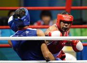 22 August 2008; Darren Sutherland, Ireland, in action against James Degale, in blue, Great Britain, during their semi-final bout in the Middleweight, 75kg, contest. Beijing 2008 - Games of the XXIX Olympiad, Beijing Workers' Gymnasium, Olympic Green, Beijing, China. Picture credit: Brendan Moran / SPORTSFILE