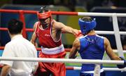 22 August 2008; Darren Sutherland, Ireland, in action against James Degale, in blue, Great Britain, during their semi-final bout in the Middleweight, 75kg, contest. Beijing 2008 - Games of the XXIX Olympiad, Beijing Workers' Gymnasium, Olympic Green, Beijing, China. Picture credit: Brendan Moran / SPORTSFILE