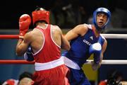 22 August 2008; James Degale, in blue, Great Britain, in action against Darren Sutherland, Ireland, during their semi-final bout in the Middleweight, 75kg, contest. Beijing 2008 - Games of the XXIX Olympiad, Beijing Workers' Gymnasium, Olympic Green, Beijing, China. Picture credit: Brendan Moran / SPORTSFILE