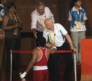 22 August 2008; Patrick Hickey, President of the OCI and President of the EOC congratulates Darren Sutherland, Ireland, on his performance against James Degale, from Great Brittan, during their semi-final bout of the Middle weight, 75kg, contest. Beijing 2008 - Games of the XXIX Olympiad, Beijing Workers Gymnasium, Olympic Green, Beijing, China. Picture credit: Ray McManus / SPORTSFILE