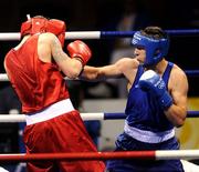 22 August 2008; Kenny Egan, Ireland, scores his first point against Tony Jeffries, in red from Great Brittan, during their semi-final bout of the Light Heavy weight, 81kg, contest. Beijing 2008 - Games of the XXIX Olympiad, Beijing Workers Gymnasium, Olympic Green, Beijing, China. Picture credit: Ray McManus / SPORTSFILE