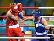 22 August 2008; Kenny Egan, Ireland, in action against Tony Jeffries, in red, Great Britain, during their semi-final bout in the Light Heavy weight, 81kg, contest. Beijing 2008 - Games of the XXIX Olympiad, Beijing Workers' Gymnasium, Olympic Green, Beijing, China. Picture credit: Brendan Moran / SPORTSFILE
