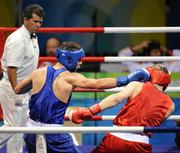 22 August 2008; Kenny Egan, Ireland, in action against Tony Jeffries, in red, Great Britain, during their semi-final bout in the Light Heavy weight, 81kg, contest. Beijing 2008 - Games of the XXIX Olympiad, Beijing Workers' Gymnasium, Olympic Green, Beijing, China. Picture credit: Brendan Moran / SPORTSFILE