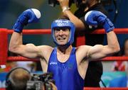 22 August 2008; Kenny Egan, Ireland, celebrates his victory over Tony Jeffries, Great Britain, during their semi-final bout in the Light Heavy weight, 81kg, contest. Beijing 2008 - Games of the XXIX Olympiad, Beijing Workers' Gymnasium, Olympic Green, Beijing, China. Picture credit: Brendan Moran / SPORTSFILE