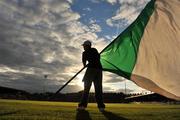 22 August 2008; A Cork City supporter waves a flag before the start of the game. eircom League of Ireland Premier Division, Cork City v Bray Wanderers, Turners Cross, Cork. Picture credit: David Maher / SPORTSFILE