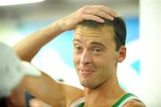 23 August 2008; Alistair Cragg, Ireland, leaves the track after the Men's 5000m Final, which he failed to finish. Beijing 2008 - Games of the XXIX Olympiad, National Stadium, Olympic Green, Beijing, China. Picture credit: Brendan Moran / SPORTSFILE