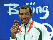 23 August 2008; Ireland's Darren Sutherland with his Olympic Bronze Medal which was presented after the final of the the Middleweight, 75kg, division. Beijing 2008 - Games of the XXIX Olympiad, Beijing Workers' Gymnasium, Olympic Green, Beijing, China. Picture credit: Ray McManus / SPORTSFILE