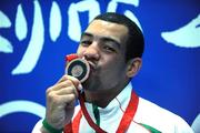 23 August 2008; Ireland's Darren Sutherland kisses his  Olympic Bronze Medal which was presented after the final of the the Middleweight, 75kg, division. Beijing 2008 - Games of the XXIX Olympiad, Beijing Workers' Gymnasium, Olympic Green, Beijing, China. Picture credit: Ray McManus / SPORTSFILE