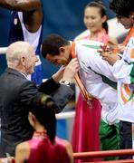 23 August 2008; Ireland's Darren Sutherland is presented with an Olympic Bronze Medal by Patrick Hickey, president of the Olympic Council of Ireland and president of the European Olympic Committee, after the final of the Middleweight, 75kg, division. Beijing 2008 - Games of the XXIX Olympiad, Beijing Workers' Gymnasium, Olympic Green, Beijing, China. Picture credit: Ray McManus / SPORTSFILE