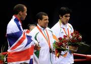 23 August 2008; Medal winners James Degale, gold, Great Britain, Darren Sutherland, bronze, Ireland, and Vijendar Kumar, silver, India, after the medal presentation for the final of the Middleweight, 75kg, division. Beijing 2008 - Games of the XXIX Olympiad, Beijing Workers' Gymnasium, Olympic Green, Beijing, China. Picture credit: Ray McManus / SPORTSFILE
