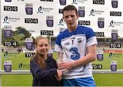 17 June 2015; Shane Bennett, Waterford, is presented with the Bord Gáis Energy Man of the Match by Bord Gáis Energy Rewards Club winner Alannah Murphy, age 10, from Castlemartyr, Co. Cork. Bord Gáis Energy Munster GAA Hurling U21 Championship, Quarter-Final, Cork v Waterford, Páirc Ui Rinn, Cork. Picture credit: Brendan Moran / SPORTSFILE