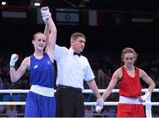 19 June 2015; Ceire Smith, Ireland, is declared victorious, by referee Denis Popov, over Camilla Johansen, Norway, following their Women's Boxing Fly 51kg Round of 16 bout. 2015 European Games, Crystal Hall, Baku, Azerbaijan. Picture credit: Stephen McCarthy / SPORTSFILE