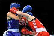 19 June 2015; Nouchka Fontijn, Netherlands, left, exchanges punches with Savannah Marshall, Great Britain, during their Women's Boxing Middle 75kg Round of 16 bout. 2015 European Games, Crystal Hall, Baku, Azerbaijan. Picture credit: Stephen McCarthy / SPORTSFILE