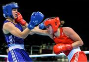19 June 2015; Savannah Marshall, Great Britain, right, exchanges punches with Nouchka Fontijn, Netherlands, during their Women's Boxing Middle 75kg Round of 16 bout. 2015 European Games, Crystal Hall, Baku, Azerbaijan. Picture credit: Stephen McCarthy / SPORTSFILE