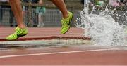 19 June 2015; An athlete races through the water jump during the Boys 1500m steeplechase. GloHealth Tailteann Inter Provincial Track and Field Championships. Morton Stadium Santry, Dublin. Picture credit: Piaras Ó Mídheach / SPORTSFILE