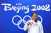 23 August 2008; Khedafi Djelkhir, France, celebrates with his Silver medal after the final of the Feather weight, 57kg, division. Beijing 2008 - Games of the XXIX Olympiad, Beijing Workers' Gymnasium, Olympic Green, Beijing, China. Picture credit: Ray McManus / SPORTSFILE
