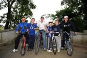 26 August 2008; Riders, from left, Marco Pinotti, Team Columbia, David O'Loughlin, Pezula, Irish National Champion Dan Martin, Garmin Chipotle H30, with local children, from left, Stephen Murphy, age 12, Cian Markey, age 12, and Niall Norman, age 12, at a photocall ahead of tomorrow's start of the Tour of Ireland. Tour of Ireland Press Conference, Crowne Plaza Hotel, Dublin. Picture credit: Stephen McCarthy / SPORTSFILE