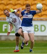 13 June 2015; Evan O'Carroll, Laois, in action against Kevin Murnaghan, Kildare. Leinster GAA Football Senior Championship, Quarter-Final Replay Kildare v Laois. O'Connor Park, Tullamore, Co. Offaly. Picture credit: Piaras Ó Mídheach / SPORTSFILE