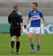 13 June 2015; Darren Strong, Laois, speaks with referee Anthony Nolan. Leinster GAA Football Senior Championship, Quarter-Final Replay Kildare v Laois. O'Connor Park, Tullamore, Co. Offaly. Picture credit: Piaras Ó Mídheach / SPORTSFILE