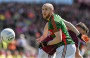14 June 2015; Tom Cunniffe, Mayo, in action against Damien Comer, Galway. Connacht GAA Football Senior Championship Semi-Final, Galway v Mayo. Pearse Stadium, Galway. Picture credit: David Maher / SPORTSFILE