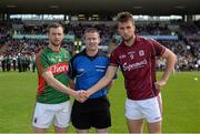 14 June 2015; Referee Padraig Hughes with captains Keith Higgins, left, Mayo, and Paul Conroy, Galway, before the game. Connacht GAA Football Senior Championship Semi-Final, Galway v Mayo. Pearse Stadium, Galway. Picture credit: Piaras Ó Mídheach / SPORTSFILE