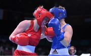 20 June 2015; Michaela Walsh, Ireland, left, exchanges punches with Elena Saveleva, Russia, during their Women's Boxing Bantam 54kg Round of 16 bout. 2015 European Games, Crystal Hall, Baku, Azerbaijan. Picture credit: Stephen McCarthy / SPORTSFILE