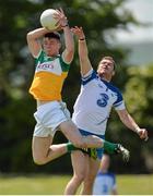 20 June 2015; Conor McNamee, Offaly, in action against Craig Guiry, Waterford. GAA Football All-Ireland Senior Championship, Round 1A, Waterford v Offaly, Fraher Field, Dungarvan, Co. Waterford. Picture credit: Matt Browne / SPORTSFILE