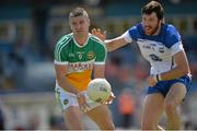 20 June 2015; Niall Smith, Offaly, in action against Tommy Prendergast, Waterford. GAA Football All-Ireland Senior Championship, Round 1A, Waterford v Offaly, Fraher Field, Dungarvan, Co. Waterford. Picture credit: Matt Browne / SPORTSFILE