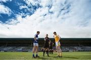 20 June 2015; Referee Derek O'Mahony performs the coin toss with captains Ross Munnelly, left, Laois and Juston Crozier, Antrim. GAA Football All-Ireland Senior Championship, Round 1A, Laois v Antrim, O'Moore Park, Portlaoise, Co. Laois. Picture credit: Piaras Ó Mídheach / SPORTSFILE