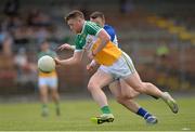 20 June 2015; Nigel Dunne, Offaly, in action against Tadhg O Huallachain, Waterford. GAA Football All-Ireland Senior Championship, Round 1A, Waterford v Offaly, Fraher Field, Dungarvan, Co. Waterford. Picture credit: Matt Browne / SPORTSFILE