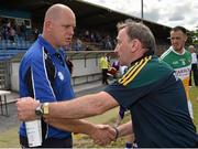 20 June 2015; Waterford manager Tom McGlinchey, left, shakes hands with Offaly manager Pat Flanagan after the game. GAA Football All-Ireland Senior Championship, Round 1A, Waterford v Offaly, Fraher Field, Dungarvan, Co. Waterford. Picture credit: Matt Browne / SPORTSFILE