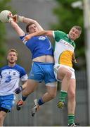 20 June 2015; Waterford goalkeeper Sean Barron drops the ball into the goal under pressure from Offaly's Niall Smith. GAA Football All-Ireland Senior Championship, Round 1A, Waterford v Offaly, Fraher Field, Dungarvan, Co. Waterford. Picture credit: Matt Browne / SPORTSFILE