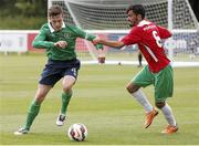 20 June 2015; Luke Evans, Ireland, in action against Pedro Santos,  Portugal. This tournament is the only chance the Irish team have to secure a precious qualifying spot for the 2016 Rio Paralympic Games. 2015 CP Football World Championships, Ireland v Portuga. St. George’s Park, Tatenhill, Burton-upon-Trent, Staffordshire, United Kingdom. Picture credit: Magi Haroun / SPORTSFILE
