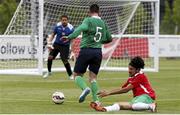 20 June 2015; Eric O'Flaherty, Ireland, gets past the tackle of Vasco Santos, Portugal. This tournament is the only chance the Irish team have to secure a precious qualifying spot for the 2016 Rio Paralympic Games. 2015 CP Football World Championships, Ireland v Portuga. St. George’s Park, Tatenhill, Burton-upon-Trent, Staffordshire, United Kingdom. Picture credit: Magi Haroun / SPORTSFILE