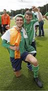 20 June 2015; Dillon Sheridan, Ireland, celebrates his side's victory with his brother after the game. This tournament is the only chance the Irish team have to secure a precious qualifying spot for the 2016 Rio Paralympic Games. 2015 CP Football World Championships, Ireland v Portuga. St. George’s Park, Tatenhill, Burton-upon-Trent, Staffordshire, United Kingdom. Picture credit: Magi Haroun / SPORTSFILE