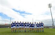 20 June 2015; Laois players stand for a minute's silence in memory of the six Irish students that died in Berkeley, USA. GAA Football All-Ireland Senior Championship, Round 1A, Laois v Antrim, O'Moore Park, Portlaoise, Co. Laois. Picture credit: Piaras Ó Mídheach / SPORTSFILE