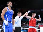20 June 2015; Dean Gardiner, Ireland, is announced victorious by referee Denis Popov following his Men's Boxing Super Heavy +91kg Round of 16 bout with Guido Vianello, Italy. 2015 European Games, Crystal Hall, Baku, Azerbaijan. Picture credit: Stephen McCarthy / SPORTSFILE