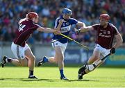 20 June 2015; Stephen Maher, Laois, in action against Joe Canning, left, and Jonathon Glynn, Galway. Leinster GAA Hurling Senior Championship, Semi-Final, Galway v Laois, O'Connor Park, Tullamore, Co. Offaly. Photo by Sportsfile