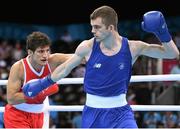 20 June 2015; Adam Nolan, Ireland, right, exchanges punches with Dario Morello, Italy, during their Men's Boxing Welter 69kg Round of 16 bout. 2015 European Games, Crystal Hall, Baku, Azerbaijan. Picture credit: Stephen McCarthy / SPORTSFILE