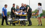 20 June 2015; Rory Dunne, Cavan, is helped onto a stretcher after sustaining an injury. GAA Football All-Ireland Senior Championship, Round 1A, London v Cavan, Páirc Smárgaid, Ruislip, London, England. Picture credit: Seb Daly / SPORTSFILE