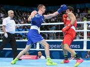 20 June 2015; Adam Nolan, Ireland, left, exchanges punches with Dario Morello, Italy, during their Men's Boxing Welter 69kg Round of 16 bout. 2015 European Games, Crystal Hall, Baku, Azerbaijan. Picture credit: Stephen McCarthy / SPORTSFILE