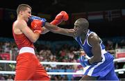 20 June 2015; Souleymane Cissokho, France, right, exchanges punches with Balazs Bacskai, Hungary, during their Men's Boxing Welter 69kg Round of 16 bout. 2015 European Games, Crystal Hall, Baku, Azerbaijan. Picture credit: Stephen McCarthy / SPORTSFILE