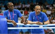20 June 2015; France boxing coaches John Dovi, left, and Luis Mariano Gonzalez Cosme watch on during the Men's Boxing Welter 69kg Round of 16 bout between Souleymane Cissokho, France, and Balazs Bacskai, Hungary. 2015 European Games, Crystal Hall, Baku, Azerbaijan. Picture credit: Stephen McCarthy / SPORTSFILE