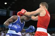20 June 2015; Souleymane Cissokho, France, left, exchanges punches with Balazs Bacskai, Hungary, during their Men's Boxing Welter 69kg Round of 16 bout. 2015 European Games, Crystal Hall, Baku, Azerbaijan. Picture credit: Stephen McCarthy / SPORTSFILE