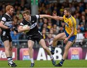 20 June 2015; Kevin McDonnell, Sligo, in action against Senan Kilbride, Roscommon. Connacht GAA Football Senior Championship, Semi-Final, Sligo v Roscommon, Markievicz Park, Sligo. Picture credit: Oliver McVeigh / SPORTSFILE