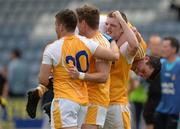 20 June 2015; Antrim players, from left, Patrick McBride, Mark Sweeney, Owen Gallagher and Dermott McAleese, celebrate after the game. GAA Football All-Ireland Senior Championship, Round 1A, Laois v Antrim, O'Moore Park, Portlaoise, Co. Laois. Picture credit: Piaras Ó Mídheach / SPORTSFILE