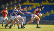 20 June 2015; Eoghan Ruth, Carlow, in action against Kevin Diffley and Peter Foy, left, Longford. GAA Football All-Ireland Senior Championship, Round 1A, Longford v Carlow, Glennon Brothers Pearse Park, Longford. Picture credit: Ray McManus / SPORTSFILE