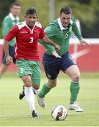 20 June 2015; Eric O'Flaherty, Ireland, in action against Hugo Pinheiro, Portugal. This tournament is the only chance the Irish team have to secure a precious qualifying spot for the 2016 Rio Paralympic Games. 2015 CP Football World Championships, Ireland v Portuga. St. George’s Park, Tatenhill, Burton-upon-Trent, Staffordshire, United Kingdom. Picture credit: Magi Haroun / SPORTSFILE